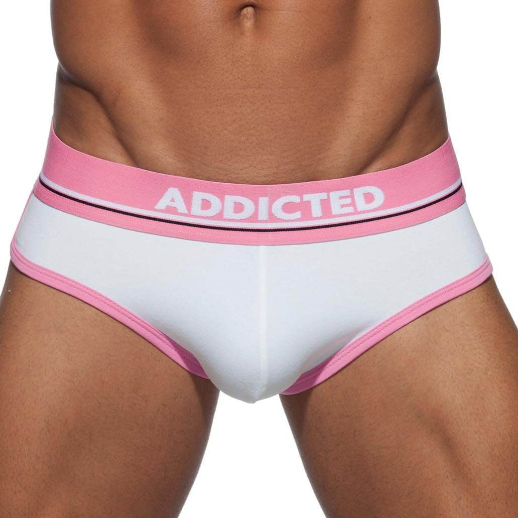 Stylischer Herren Slip in weiß mit rosa Kontrasten 'CURVE BRIEF' aus der Addicted Underwear Kollektion, Frontansicht